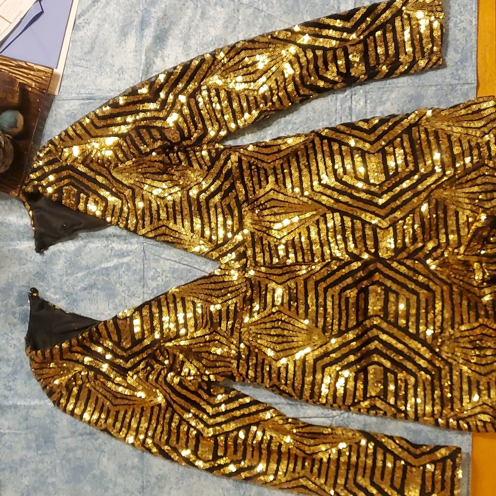 Woman's black and gold sequins long-sleeved romper